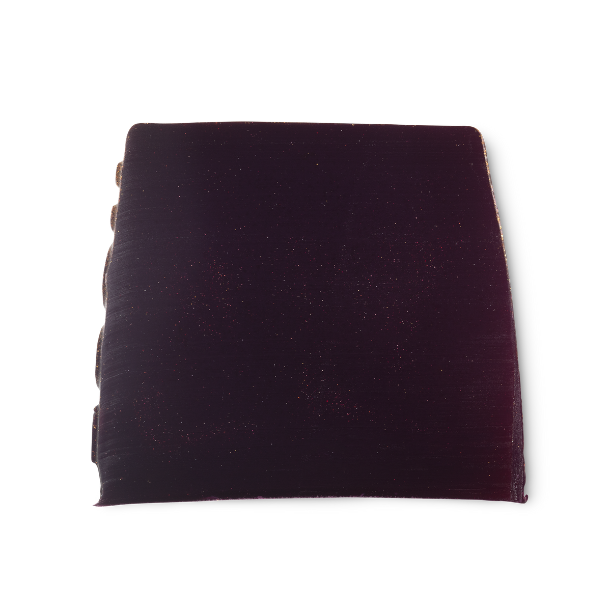 Goddess. A deep purple, smooth, trapezium shaped soap, with a touch of shimmer, and bumps along its left side.